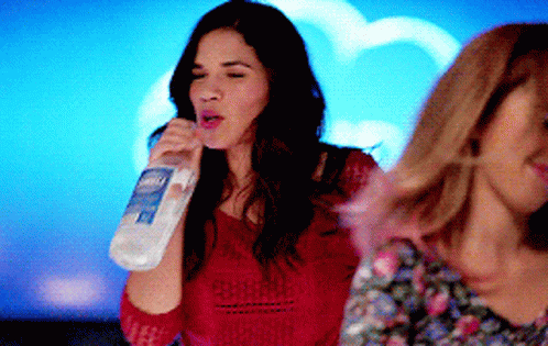 Amy from superstore drinking gif.